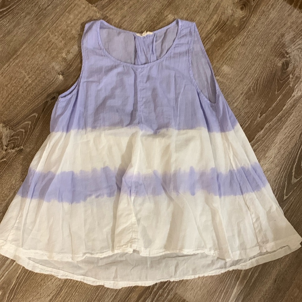 Purple and white top, small pleat in back.